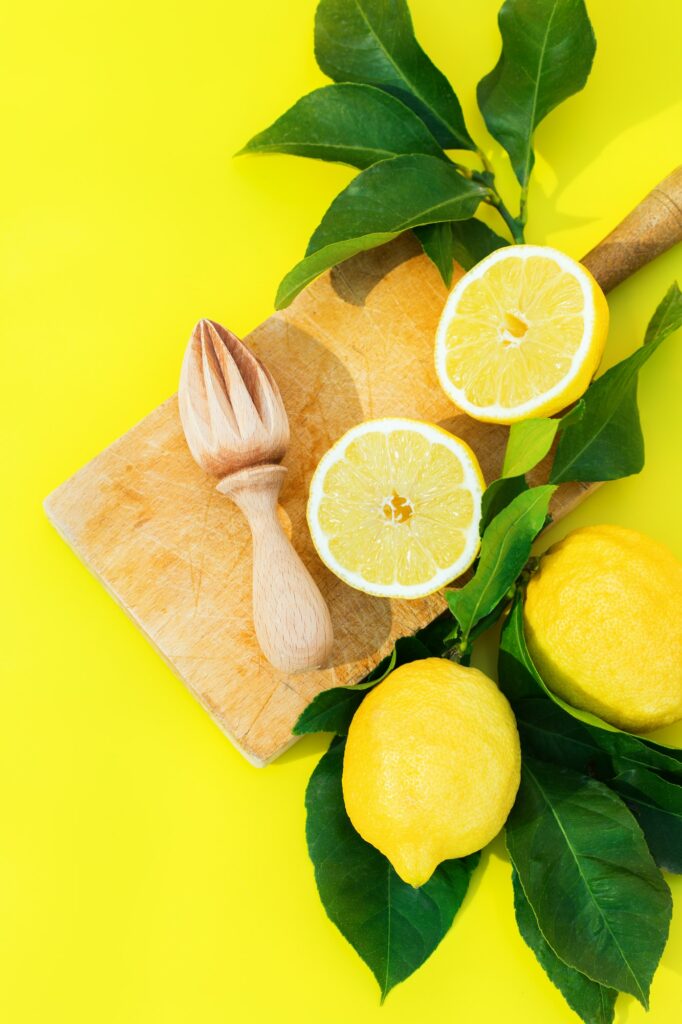 Summer, vitamin, immune boost concept, lemon fruit on yellow